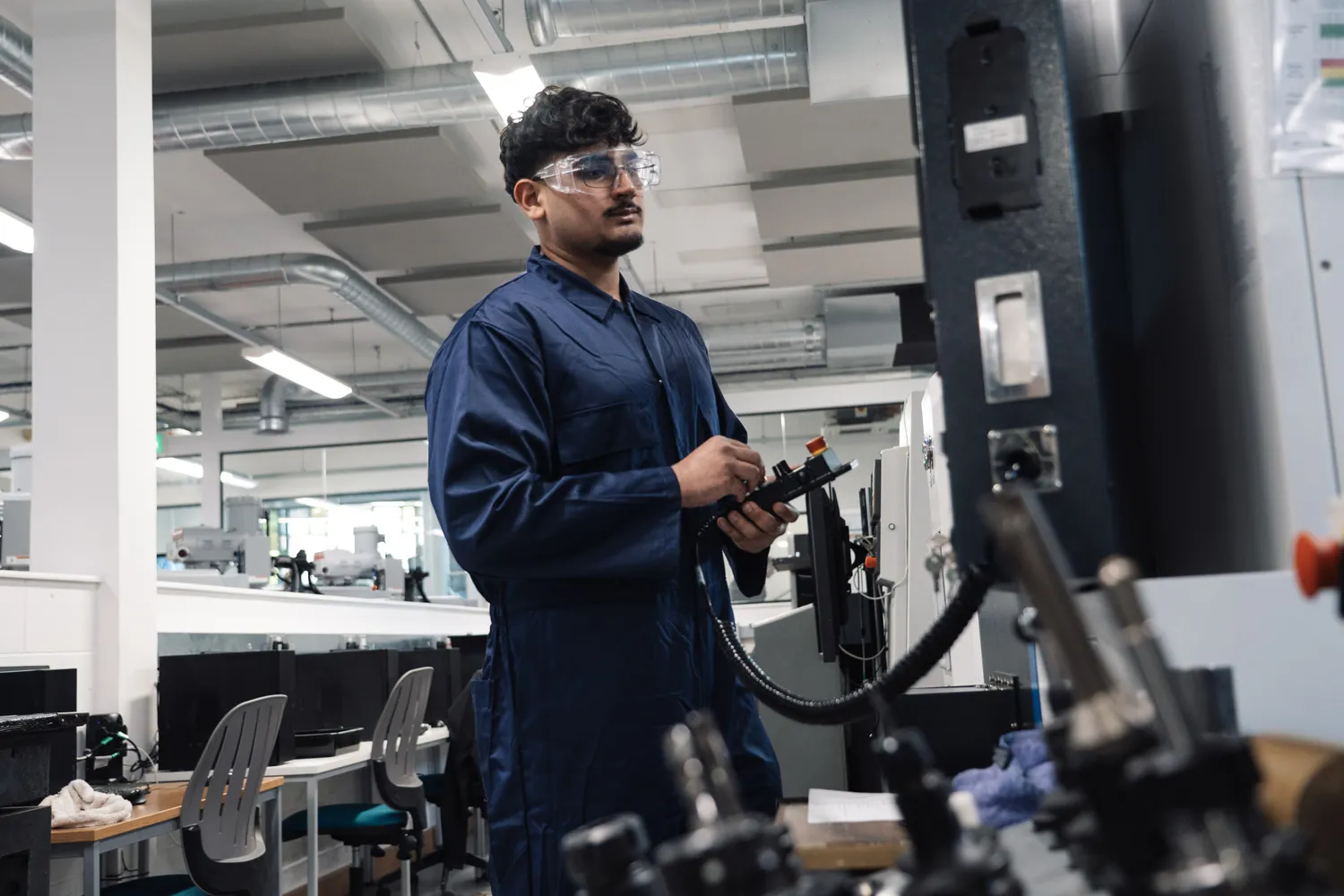 engineering student using equipment